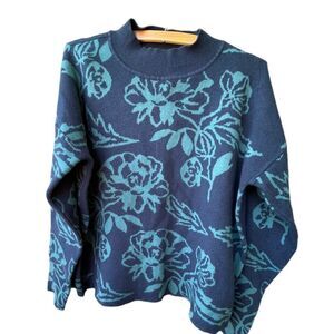 Cyrus size L mock turtleneck floral print sweater.
